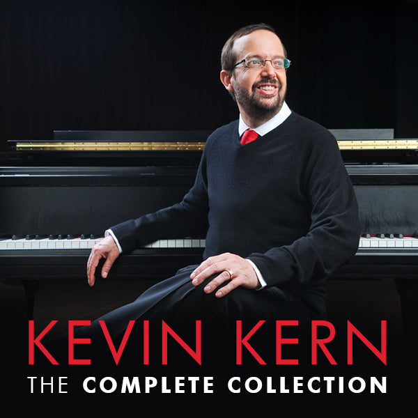 Kevin Kern seated in front of a Steinway concert grand piano wearing a black sweater, red tie and white shirt. Titled "Kevin Kern - The Complete Collection", a Spotify playlist.