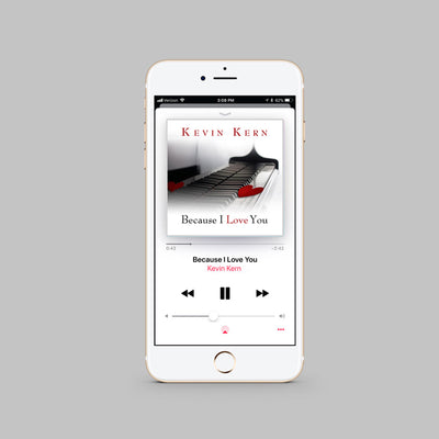 An iPhone displaying the digital single by Kevin Kern, his arrangement of the song entitled "Because I Love You".